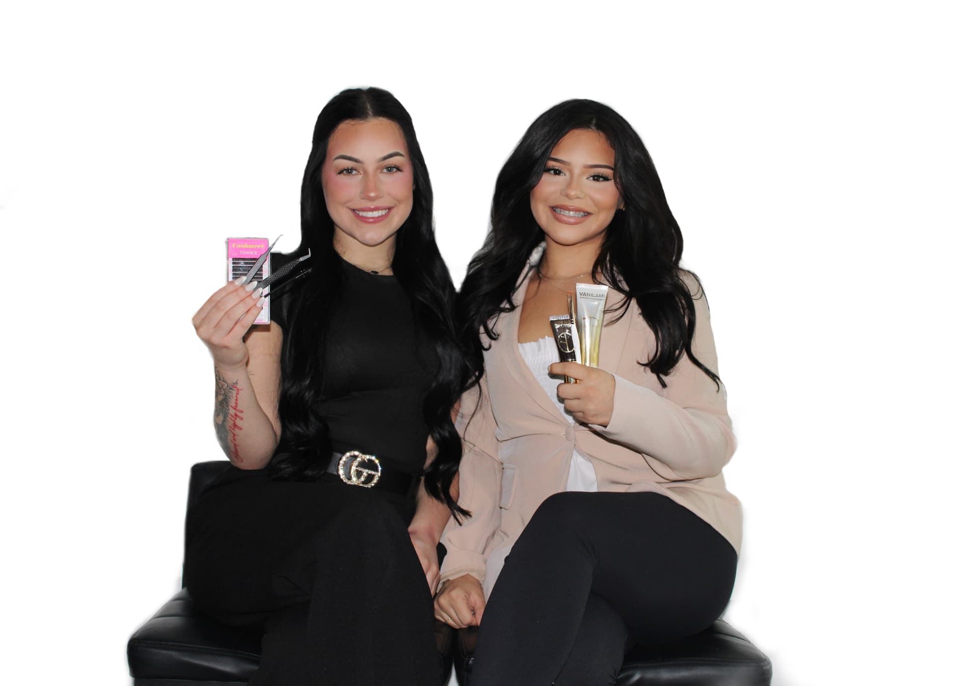 Kam and Isabelle holding their lash and brow products